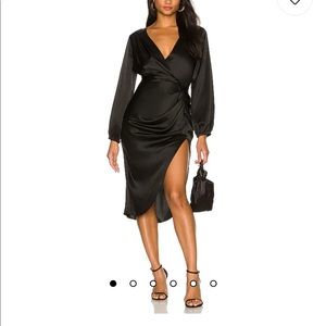 Beautiful Amanda Uprichard Roma dress in black. Size medium. NWT.